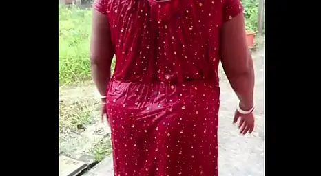 Big-titted Chinese hottie DasX R gets drenched in the rain while flashing off her curvaceous assets