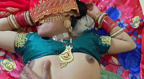 Beautiful Indian couple engaged in passionate bedroom activities