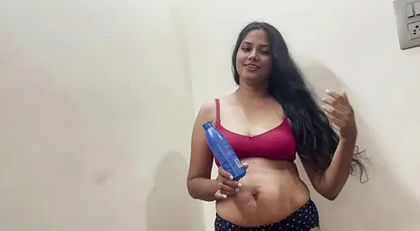 Sexy Asian woman with big natural tits does massage and gives a blowjob to her client