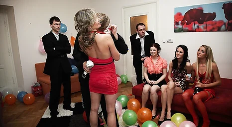 Cool poking women at a B-day soiree
